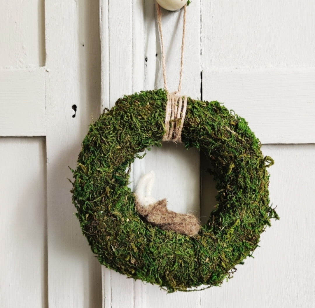 Pupunen sammalpesässä